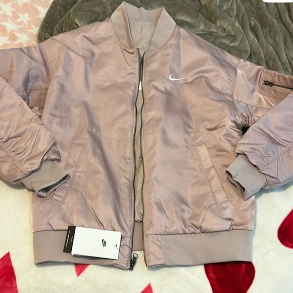 NIKE WOMEN’S REVERSIBLE VARSITY BOMBER JACKET - Picture 9 of 10